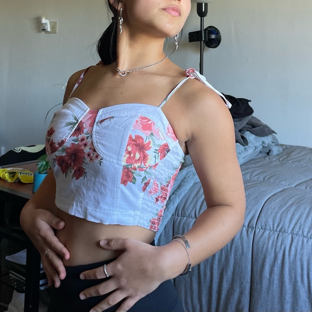 White and Pink flowered crop top. Tighter material.